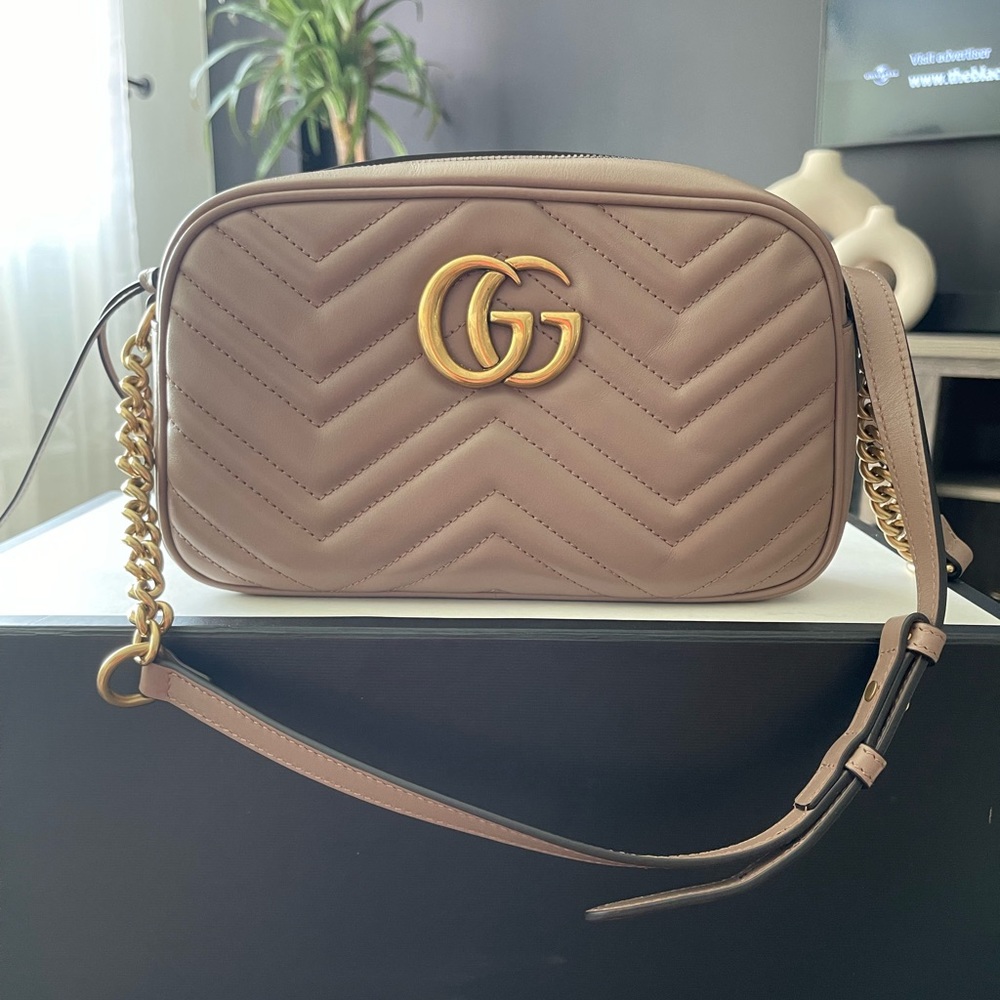 Dusty pink Gucci bag.